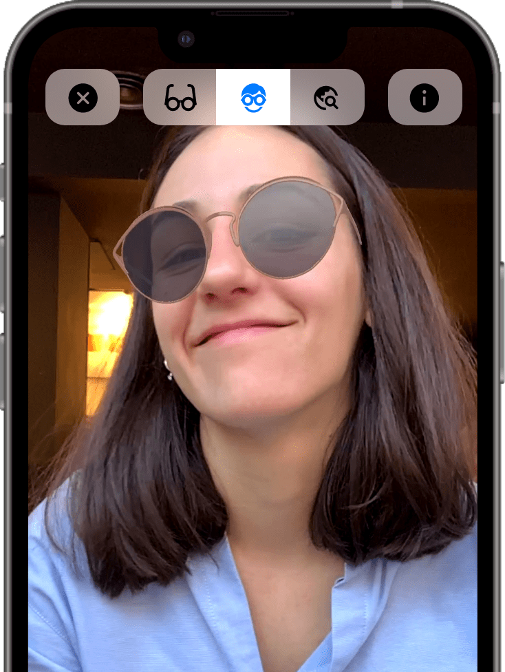 Reliby app screenshot. Woman virtually trying on some glasses.